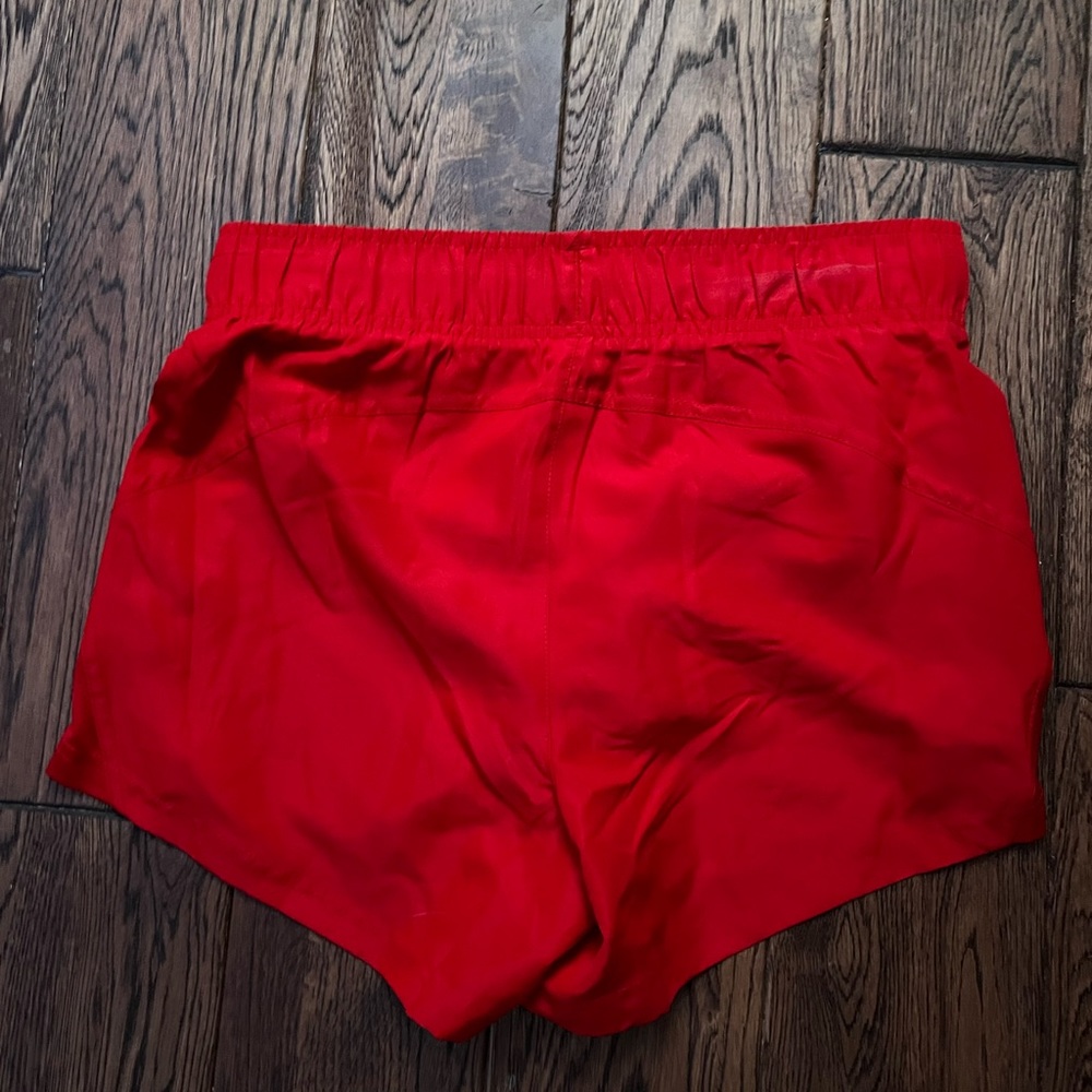 red high rise running shorts